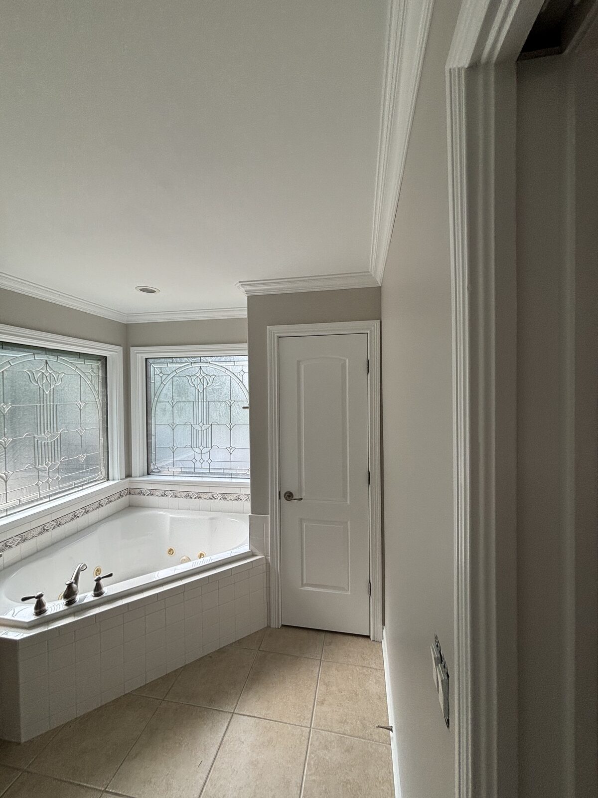 Primary bathroom with soaking tub after interior painting in Cedar Pointe, Corydon IN