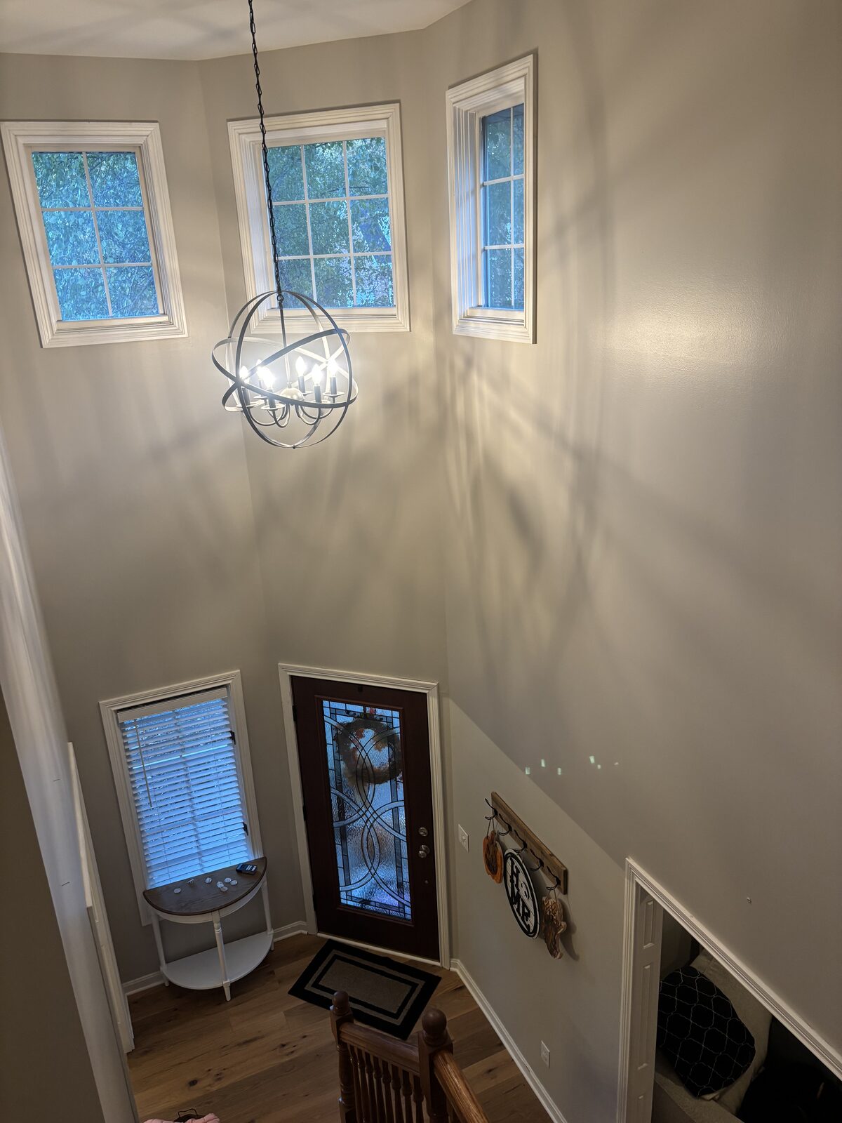 Two-story foyer and entryway after interior painting in Plum Lake, Sellersburg IN