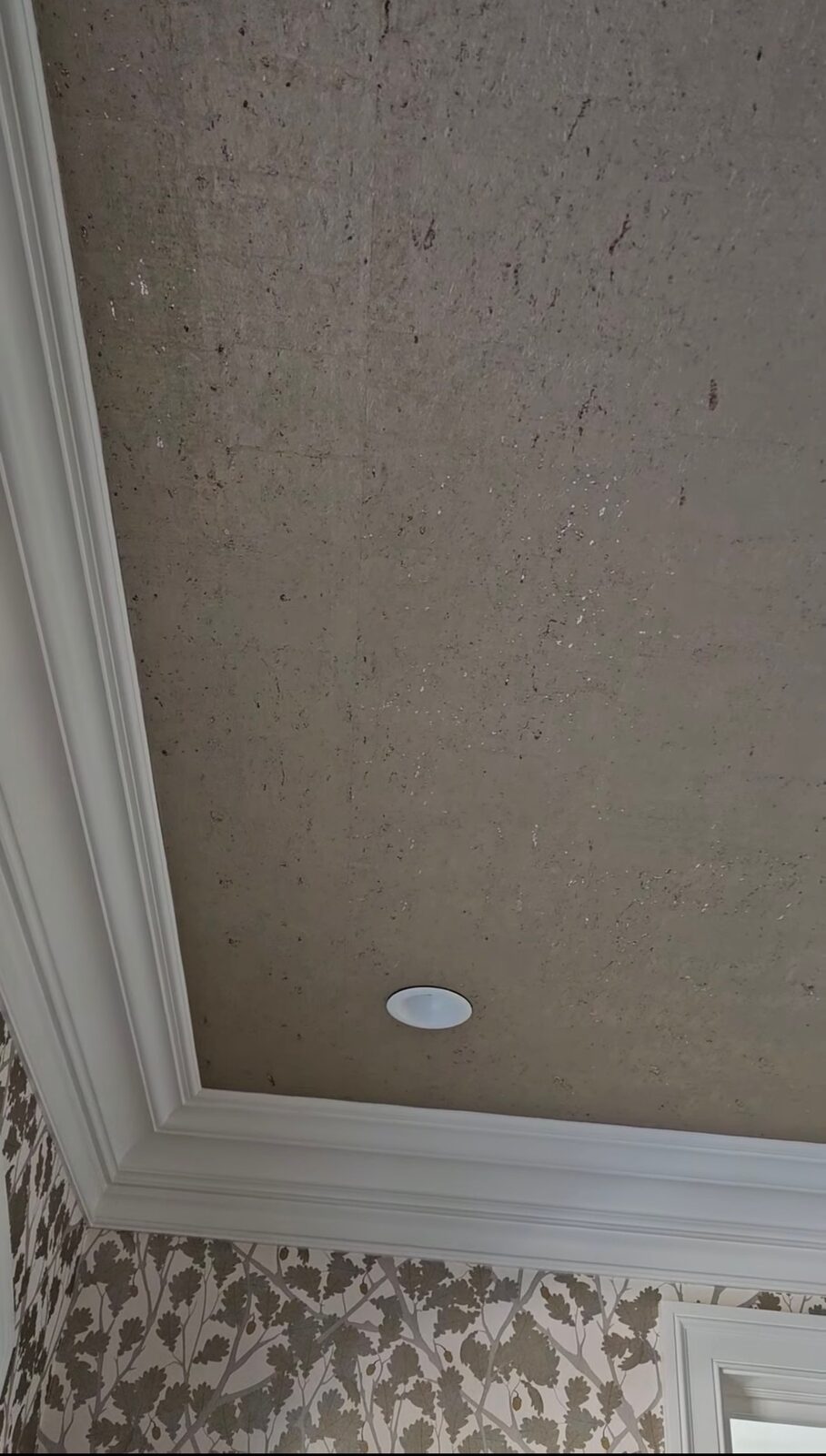 Textured wallpaper installed on a ceiling in a Louisville, KY home
